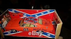 164 Dukes of Hazzard General Lee die cast car. Signed by Cooter, rosco, and john