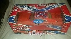 164 Dukes of Hazzard General Lee die cast car. Signed by Cooter, rosco, and john