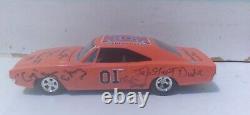 Autographed dukes of hazzard general lee toy car