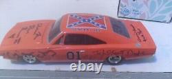 Autographed dukes of hazzard general lee toy car