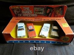 Dukes of Hazzard General Lee 1981 ERTL 1/64 4 Car Set Cadillac, Cop Car, Truck