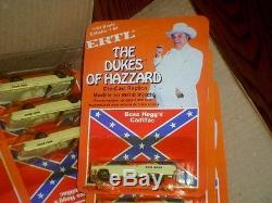 Full Case of 24 The Dukes Of Hazzard 1981 Boss Hogg Cadillac 164 Scale Mint/New