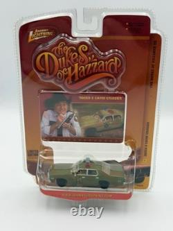 Johnny Lightning Dukes of Hazzard R5 Rosco's Camo Cruiser 1974 Dodge, 164, NIB