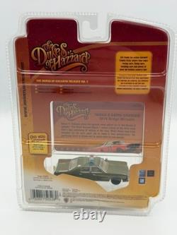 Johnny Lightning Dukes of Hazzard R5 Rosco's Camo Cruiser 1974 Dodge, 164, NIB