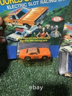 The Dukes of Hazzard the General Lee car and a Hazzard County police cruiser
