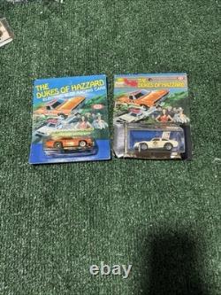 The Dukes of Hazzard the General Lee car and a Hazzard County police cruiser