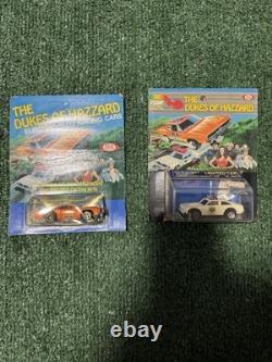 The Dukes of Hazzard the General Lee car and a Hazzard County police cruiser